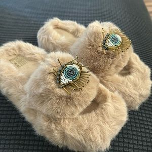 Fuzzy evil eye slippers